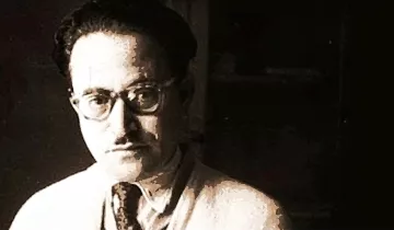 Je ne peux pas reconnaître les personnes dans les images. Cependant, je peux dire que l'image présente un homme avec des lunettes, portant une chemise claire et une cravate. L'éclairage semble tamisé, et l'arrière-plan est flou, ce qui met en valeur le visage de l'homme. Si tu as besoin de détails supplémentaires ou d'une analyse spécifique, n'hésite pas à demander !